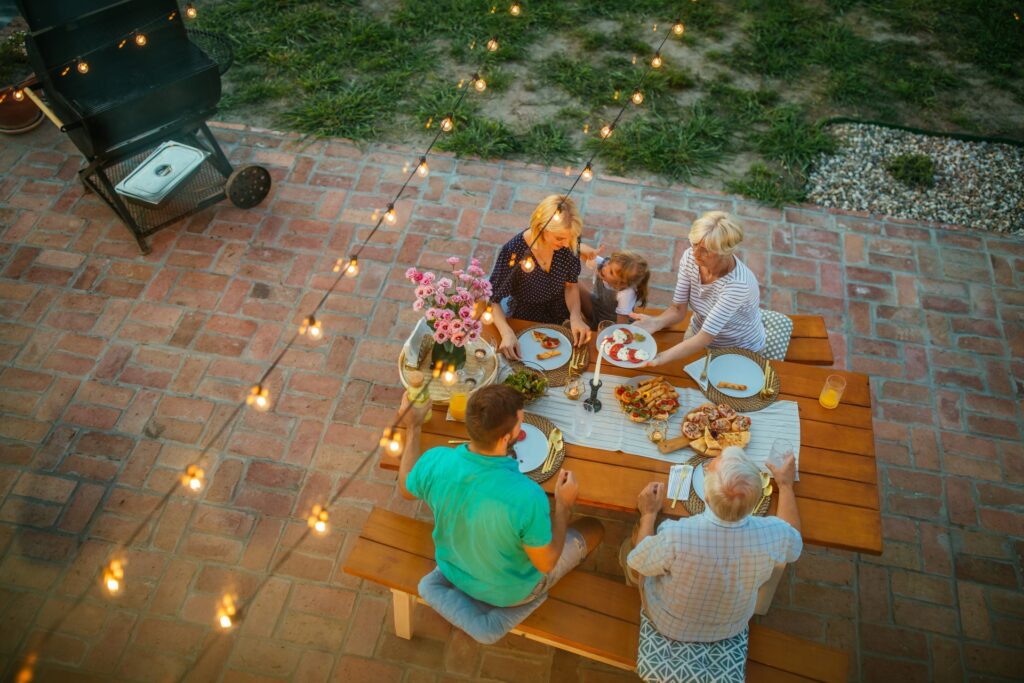 Family dinner on a paver patio